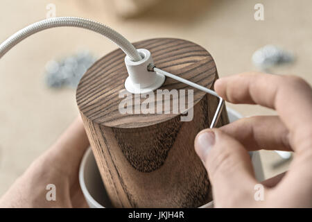 Lamp assembling in workshop Stock Photo