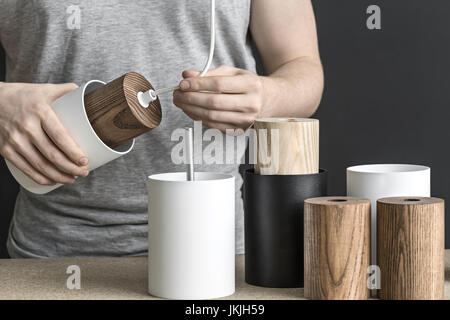 Assembling of lamp in workshop Stock Photo