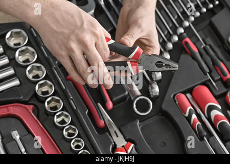 Open toolbox and male hands Stock Photo