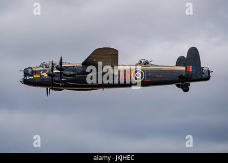 RAF BBMF Avro Lancaster bomber in solo flypast after leading the Thompson Formation at the Royal International Air Tattoo, UK on the 14th July 2017. Stock Photo