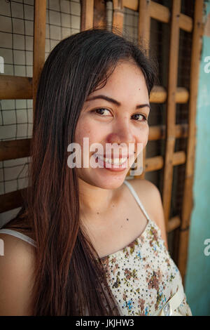 https://l450v.alamy.com/450v/jkjhw3/head-and-shoulders-portrait-of-a-twenty-year-old-filipino-woman-in-jkjhw3.jpg