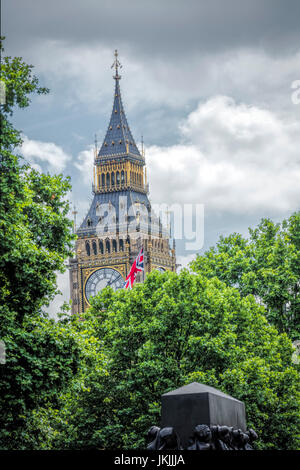Big Ben behind trees in London Stock Photo