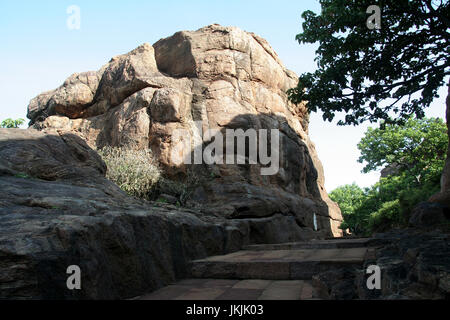 Rock by the side of stone pavement on northern hill at Badami, Karnataka, India, Asia Stock Photo