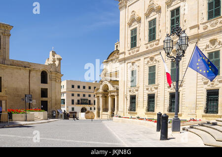The Castille Place with Our Lady of Victories Chapel,  Roman Catholic Church of Saint Catherine of Italy and  the Auberge de Castile et Leon with malt Stock Photo