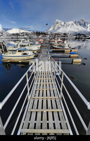Metal gangway-fishing port in Sildpolltjonna bay. Mounts Sautinden- Medmorratinden-Humpen-Hankammen-Brettviktindan-Higravtindan-Lilandstinden. Austnes Stock Photo