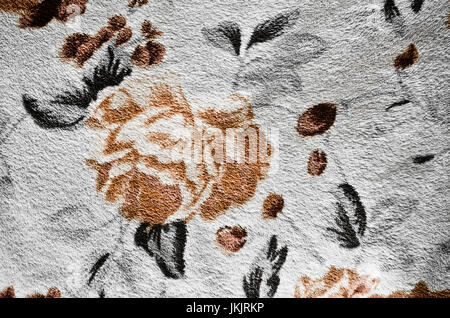 Fragment of colorful retro textile pattern with floral ornament useful as background Stock Photo