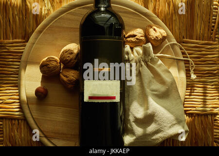 Passover holiday concept with wine and matzoh over rustic background Stock Photo