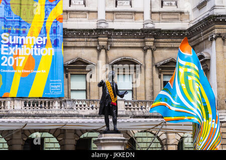 Statue of Joshua Reynolds, Summer Exhibition 2017 banner 'Wind Sculpture' by Yinko Shonibare, Royal Academy Burlington House Piccadilly London England Stock Photo