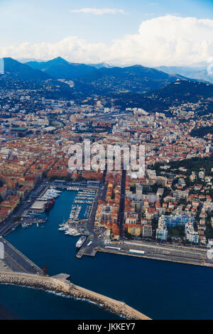 NICE, FRANCE - August 16th, 2016: Aerial view of the city of Nice, France and surrounding coastline while landing at Nice Airport on a serene summer a Stock Photo