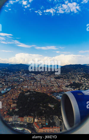 NICE, FRANCE - August 16th, 2016: Aerial view of the city of Nice, France and surrounding coastline while landing at Nice Airport on a serene summer a Stock Photo