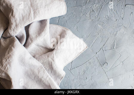 Kitchen towel or napkin over the rustic concrete table. View from above with copy space Stock Photo
