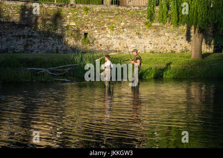 Fisherman in the river in the Cacabelos, Spain. Camino de Santiago. Stock Photo