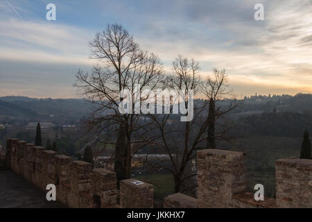 View of the ancient wall of Certosa di firenze and Tuscan landscape on background. Italy. Stock Photo
