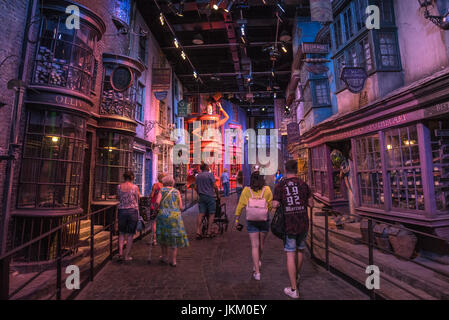 LEAVESDEN, UK - JUNE 19TH 2017: Visitors wander through the Diagon Alley movie set, at the Making of Harry Potter Studio tour at the Warner Bros. Stud Stock Photo