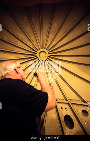 Skilled aerospace workers build a commercial Boeing 737 aircraft. Stock Photo