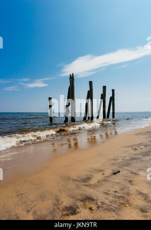 Old destroyed pier in water of Baltic sea, Orlowo, Poland Stock Photo