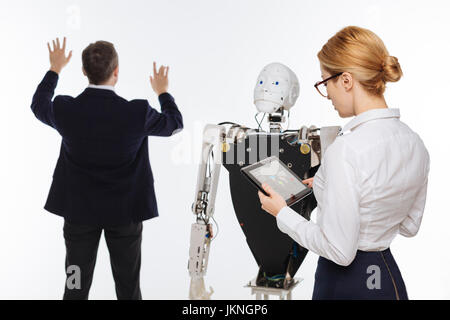 Classy brilliant lady monitoring the experiment Stock Photo