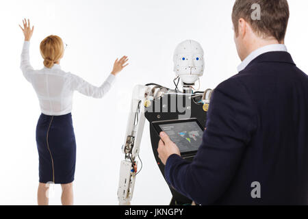 Savvy progressive scientist carrying out an experiment Stock Photo