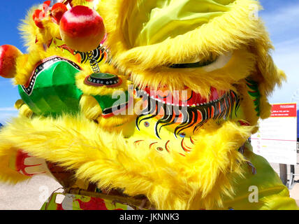 Blackpool, UK. 23rd July, 2017. Blackpool's First international carnival: Todays first international carnival takes place in the seaside town under glorious summer sunshine on the Promenade between Central and South piers. A colourful dragon from the Liverpool Chinese community.Credit: Kev Walsh/Alamy live news Stock Photo