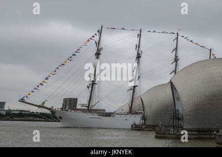 London, UK  24th July 2017. 115 metre long Peruvian Navy training ship, BAP Union, Passes through the Thames Barrier heading towards West India Dock,Canary Wharf where it will be open to the general public to climb aboard between 25th til 29th July.Like other similar ships, Unión has been conceived not only for training purposes, but also to be a sailing ambassador for its home country. Due to its features and dimensions, it has been considered (as of the date it was commissioned) the largest sail vessel in Latin America. Credit: claire doherty/Alamy Live News Stock Photo