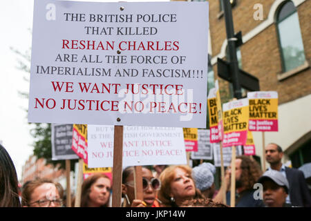 Stoke Newington Police Station. Hackney. London, UK. 24th July, 2017. Campaigners holds a vigil outside Stoke Newington Police Station in Hackney, East London, demanding 'justice' for Rashan Charles who died after being chased by police officers in the early hours of 22 July. Credit: Dinendra Haria/Alamy Live News Stock Photo