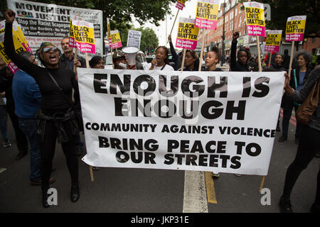 London, UK. 24th July, 2017. Demonstrators stand outside Stoke Newington Police station to protest the death of Rashan Charles who died after being chased and arrested by police in east London. Credit: Thabo Jaiyesimi/Alamy Live News Stock Photo
