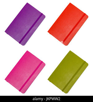 Collection closed paper notepad (red, green, pink, purple) isolated on white background. Stock Photo