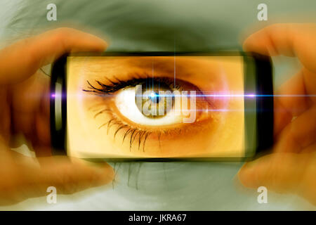 Eye in smartphone camera, symbolic photo for nosy parkers, Auge in Smartphone-Kamera, Symbolfoto für Gaffer Eye in smartphone camera, symbolic photo for nosy parkers, Auge in Smartphone-Kamera, Symbolfoto für Gaffer
