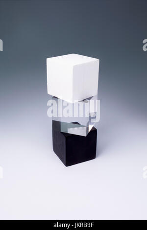 Various block shapes arranged on gray background Stock Photo