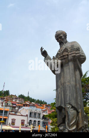 Saint Clement, at lakeside square, with old town in background, Ohrid, Macedonia Stock Photo