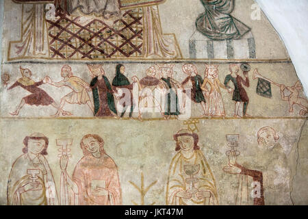 Danish medieval religious fresco from the 14th century in the Romanesque style Oerslev Church depicting a chain dance scene  (or dancing frieze).  Roy Stock Photo