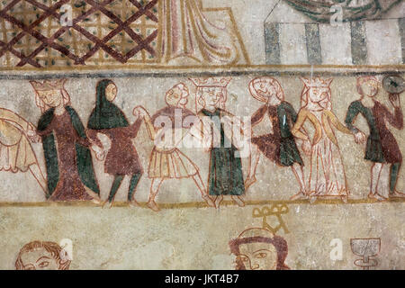 Danish medieval religious fresco from the 14th century in the Romanesque style Oerslev Church depicting a chain dance scene  (or dancing frieze).  Roy Stock Photo