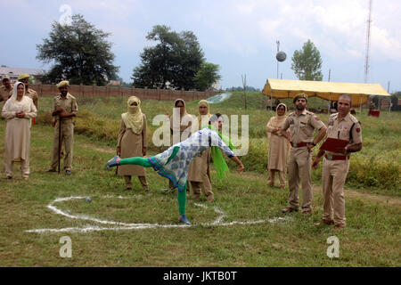 Anantnag, India. 24th July, 2017. Kashmiri girls participate to qualify the test during a police recruitment rally on July 24, 2017 in Anantnag, India. A recruitment drive by the police in Kashmir evoked an overwhelming response, with nearly 3,000 young men and women turning up for it. The candidates, who have qualified the physical test, will have to appear in the written test for final selection for which the dates will be issued separately. Credit: Muneeb Ul Islam/Pacific Press/Alamy Live News Stock Photo