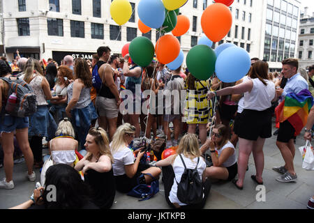 Revellers celebrating Pride parade in London, UK. Stock Photo