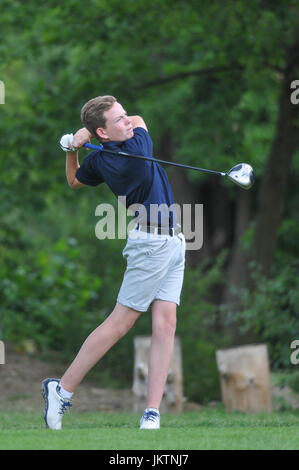 Junior child teenager golfer playing golf Stock Photo