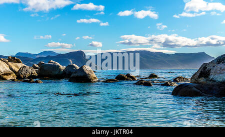 Large granite boulders at Boulders Beach, a popular nature reserve and home to a colony of African Penguins, in the village of Simons Town in the Cape Stock Photo