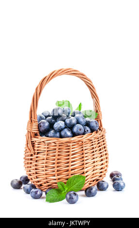 Basket with blueberries isolated on white background. Stock Photo