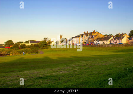 A view of the coastal village of Groomsport on the County Down coast of Belfast Lough in Northern Ireland taken in the soft evening sunlight on a fine Stock Photo