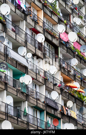 Many satellite dishes on balconies on social housing apartment blocks at Pallasseum on Pallastrasse in Schoeneberg district of Berlin, Germany. Stock Photo