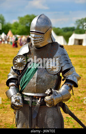 Single mediaeval knight in shining armour on field of battle of Tewkesbury in 1471, re-enactment