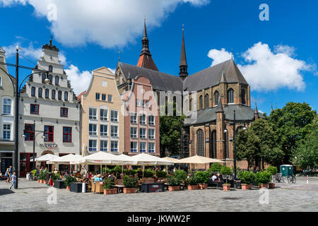 new market, street cafe, St Marys church , Marienkirche, Rostock , Mecklenburg-Vorpommern, East Germany Stock Photo