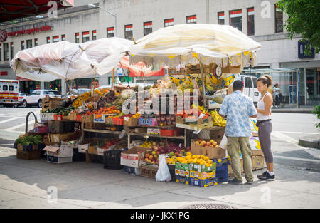 A fruit and vegetable vendor in the Chelsea neighborhood of New York on Saturday, July 15, 2017.  (© Richard B. Levine) Stock Photo