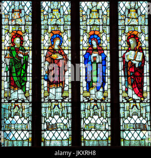 St. Paul, St. Martha, St. Mary, St. Luke, stained glass window by Heaton, Butler & Bayne, 1878, Swaffham, Norfolk, England, UK Stock Photo