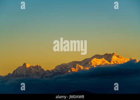 Dramatic landscape Kangchenjunga mountain with colorful from sunlight at Sandakphu, north of India Stock Photo