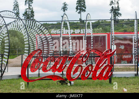 BONTIDA, ROMANIA - JULY 13, 2017: Empty Coca Cola bottles are arranged in a shape at Electric Castle festival Stock Photo