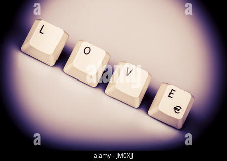Word love formed with computer keyboard keys on white background with shadow Stock Photo