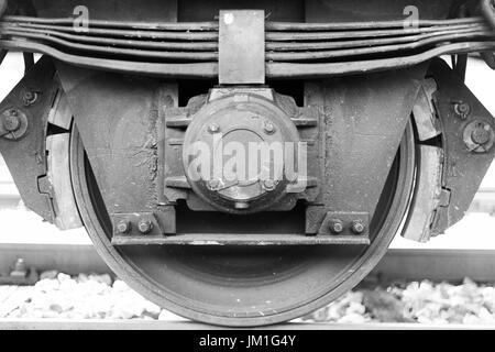 Train Wheel and brake close up on a freight train railway Stock Photo