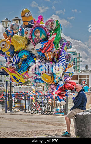 Balloon Seller The Bay Area cardiff Glamorgan UK Stock Photo