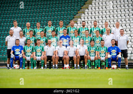 Bohemians 1905 team pose for family photo prior to the Czech soccer league season 2017/2018 in Prague, Czech Republic, July 25, 2017. Upper row L-R Doctor Marek Burian, David Bartek, Dominik Masek, Petr Buchta, Lukas Hulka, Jak Kuchta, Jani Udinov, Jevgenij Kabajev (Evgeni Kabaev), Martin Hasek and Doctor David Erhart. Middle row L-R: Custod Radek Balog, Phisiotherapist Matej Sandera, Antonin Vanicek, Martin Dostal, Rudolf Reiter, Marek Kouba, Michal Svec, Siim Luts, Milan Kocic, Masseur Martin Vavra and Head Manager Libor Koubek. Front row L-R Tomas Frystak, Michal Smid, Daniel Krch, Fitness Stock Photo