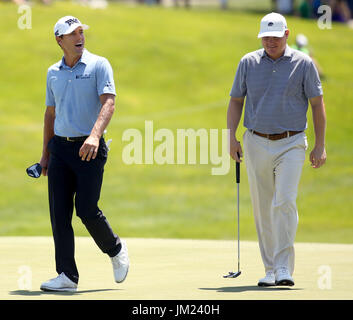 Silvis, Iowa, USA. 15th July, 2017. Charles Howell III and Chad Campbell smile as they walk on the eighth green, Saturday, July 15, 2017, during third round action of the John Deere Classic at TPC Deere Run in Silvis. Credit: John Schultz/Quad-City Times/ZUMA Wire/Alamy Live News Stock Photo